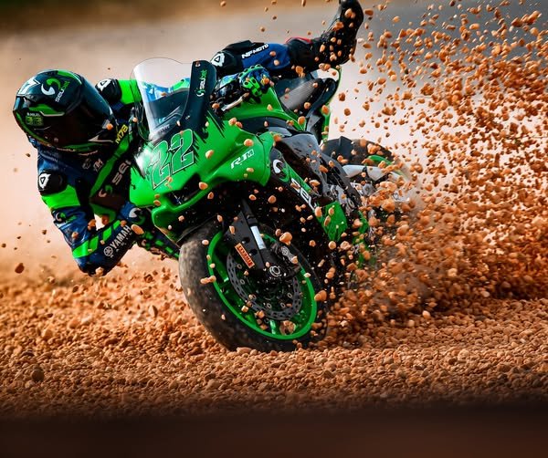 NFmoto rider on track in a custom leather race suit